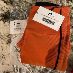 ZYIA Ribbed Leggings in Vibrant Orange